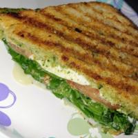 18. Veggie Pesto Caprese Sandwich · Grilled veggies, mozzarella and pesto on wheat. Vegetarian.