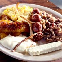 Traditional Breakfast · The traditional breakfast is served with fried plantains, scrambled eggs, salvadorian sausag...