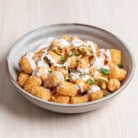 Totchos · Queso, jalapenos, sour cream, chipotle, mayo and green onion. Add bacon, chili, guacamole fo...