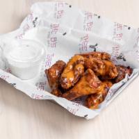 10 Smoked Wings · Up to 2 sauces.