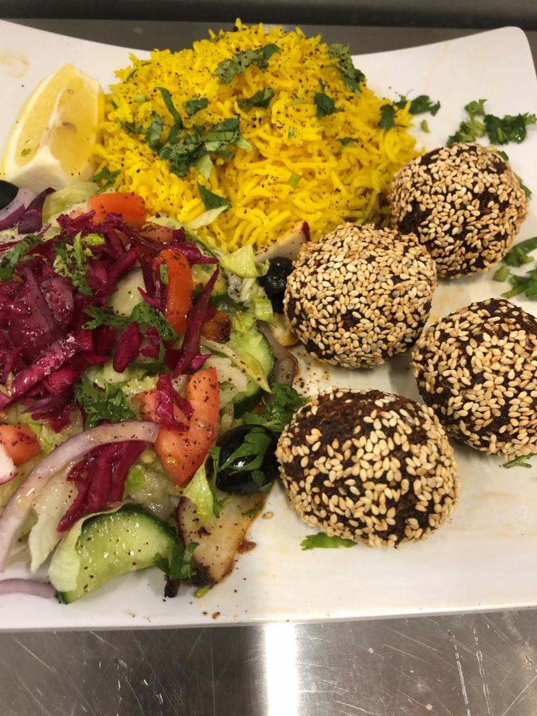 Falafel Rice Plate with 2 Sides · Organic garbanzo beans, fresh green veggies, fresh cilantro, parsley, middle eastern spices.