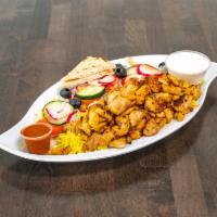 Chicken Shawarma Rice Plate · Slow roasted all-natural chicken thighs  marinated in yogurt and  shawarma spices.