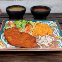 Pechuga Empanizada · Breaded Chicken breast with side of rice beans, salad and tortillas.
