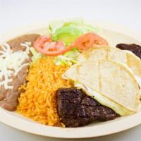 Bistec a la Timpiquena Specialty · Tender skirt steak, cheese quesadillas, rice and beans.