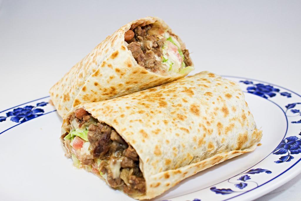 Burrito · Contains lettuce, tomato, cheese, beans and sour cream with choice of filling.