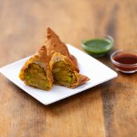 2 Vegetable Samosas · Triangular pastry with mildly spiced potatoes, peas and garam masala. Contains gluten. Vegan...