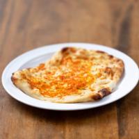 Garlic Naan · Topped with roasted garlic. Contains dairy and gluten. 