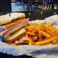 Club Sandwich · Turkey, ham or bacon. Served with 1 side.