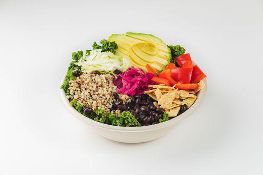 Pico Kale Grain Bowl · Tri -color quinoa, massaged kale, avocado, black beans, red bell peppers, cabbage, pickled red onions and tortilla chips with pico de gallo vinaigrette. Vegetarian. Spicy. Dairy-free. Gluten-free.