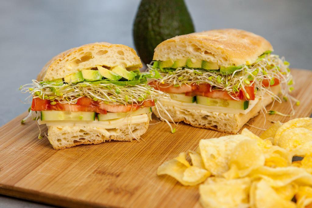 Avocado Pepper Jack Sandwich · Avocado, pepper jack cheese, green leaf lettuce, sprouts, English cucumbers and tomatoes on ciabatta bread, brushed with Meyer lemon vinaigrette. Vegetarian. (No Modifications)