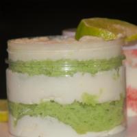 Cake In a Jar · Delicious moist layers of cake layered with triple whipped buttercream icing in an 8 oz jar.