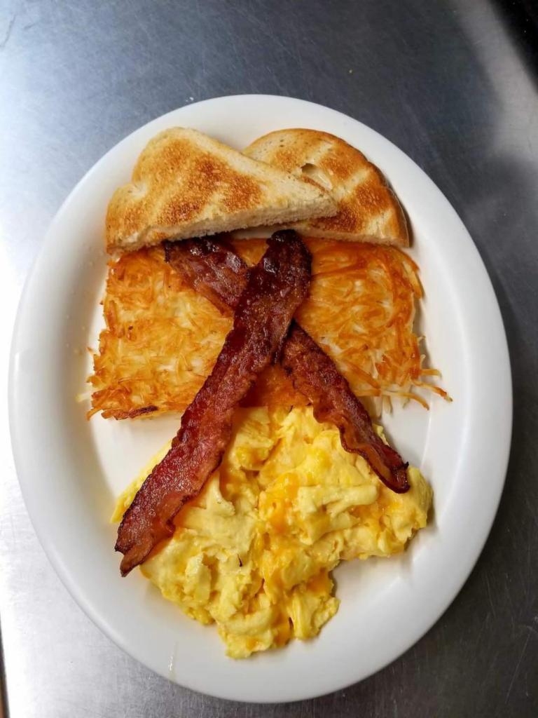 Good Morning Breakfast · 3 eggs your way, bacon or sausage link and hash browns.