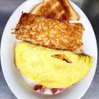 Northern Omelet · Ham, mushrooms, and choice of cheese (Swiss, American or cheddar). Served with hash brown.
