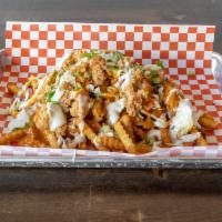 Monster Fries Special · Large portion of seasoned fries topped with chopped tenders, slaw, pickle and house sauces.