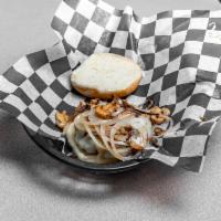 Mushroom Swiss Burger · Patty topped with cooked mushrooms and swiss cheese. 