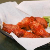 12 Boneless Wings · Seasoned boneless wings tossed in choice of sauce, or none at all. Served with choice of dip...