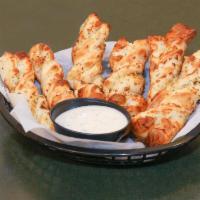 6 Garlic Parmesan Twists · Rolled fresh daily and baked to perfection with fresh garlic and Parmesan cheese.