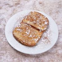 Mo's French Toast · A Single Serving Of Mo's Signature French Toast Brushed With Cinnamon A Hint Of Powdered Sug...