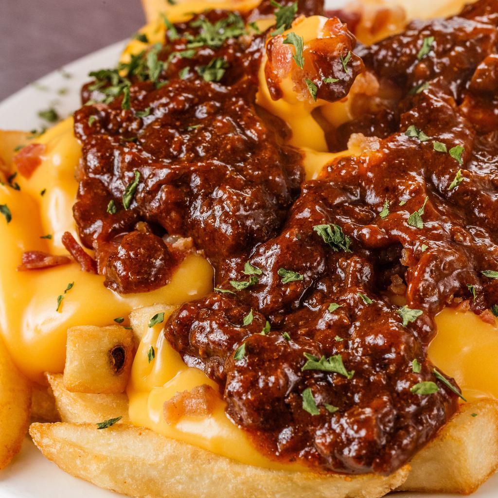 Chili Cheese Fries · French fries with chili and melted cheese on top. 