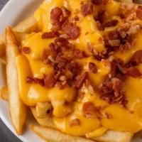Cheese Bacon Ranch Fries · French fries with melted cheese, ranch and bacon. 