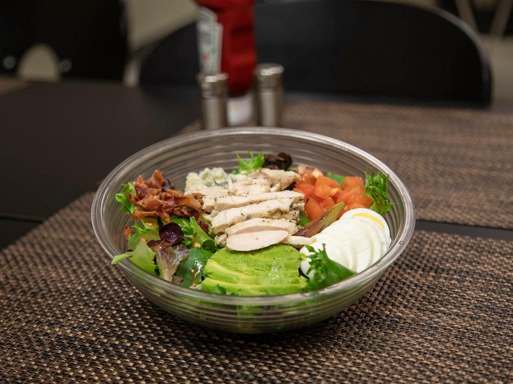 Cobb Classic Salad · Grilled chicken, bacon, avocado, tomatoes, black olives, egg, bleu cheese.