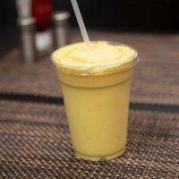 Tropical Explosion Smoothie · Peach, mango, banana and pineapple juice.