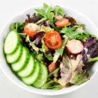 Green Salad(V) · Mix green salad with sesame soy dressing.