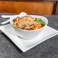 Chicken Salad · Choice of grilled chicken breast or our Buffalo chicken tenders over a bed of mixed greens w...