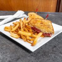 Corned Beef Sandwich · First cut lean corned beef brisket.  Served traditionally Reuben style or cold with cole sla...