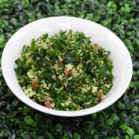 Garlic Kale Quinoa Salad · Kale, organic quinoa, garlic, lemon and Parmesan cheese. Gluten free and vegetarian.