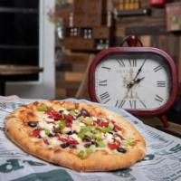 Mediterranean Pizzeta · Kalamate olives, roasted peppers, feta cheese, green onions, Mozzarella cheese.