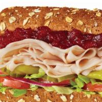 #5 Turkey & Cranberry Sandwich · 1/4 lb. of turkey, whole berry sauce, and mayo. Served Togo's style (lettuce, tomatoes, onio...