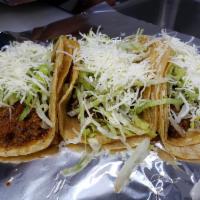 Picadillo Taco · Ground beef, lettuce, cheese.
