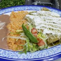 Chicken Enchilada · Comes with rice, 
beans, and sour cream.