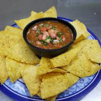 Housemade Salsa · Served with chips.