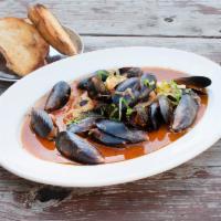 Mussels Marinara · 1 lb. of fresh mussels sauteed to perfection. Served with garlic dipping bread.