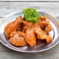  12 Boneless Chicken Wings · It's simple, we hand batter our chicken and fry them till they are golden brown perfection.