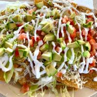 Nachos · Beans, cheese, sour cream, lettuce, tomato and avocado. Add choice of meat for an additional...