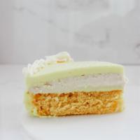 Lemon Cheesecake Cake Slice · Vegan lemon cake with a top layer of cheesecake.
