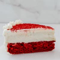 Red Velvet Cheesecake Cake Slice · Vegan red velvet cake with a top layer of cheesecake.
