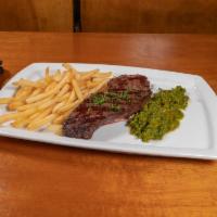 Hanger Steak Frites · Hanger Steak Marinated in Fresh Herbs and EVOO Grilled and Served with House-Made Chimichurr...
