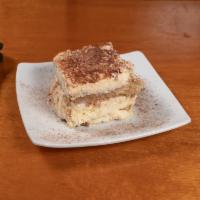 Tiramisu · Coffee soaked cake with chocolate and mascarpone cheese.
