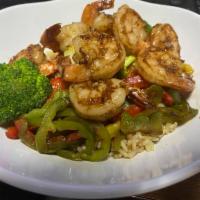 Honey Garlic Shrimp  · Shrimp sauteed in our honey garlic sauce over fried rice & mixed vegetables