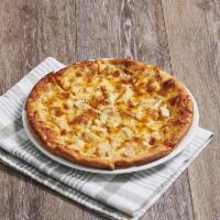 Chicken Alfredo Specialty Pizza · Freshly baked chicken cutlet with creamy Alfredo sauce and shredded cheese.