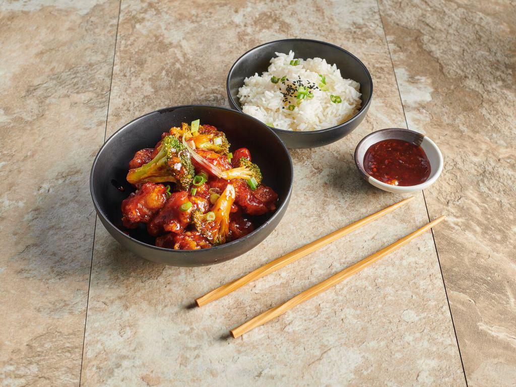 13. General Tso's Chicken Dinner Special · Served with roast pork fried rice and egg roll. Hot and spicy.