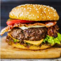 Bacon Cheeseburger Deluxe · 12 oz. beef (ground blend, chuck, brisket, sirloin). Served with lettuce, tomatoes, french f...