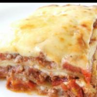 Meat Lasagna · Mama's style. Served with salad, bread and butter and Romano cheese.
