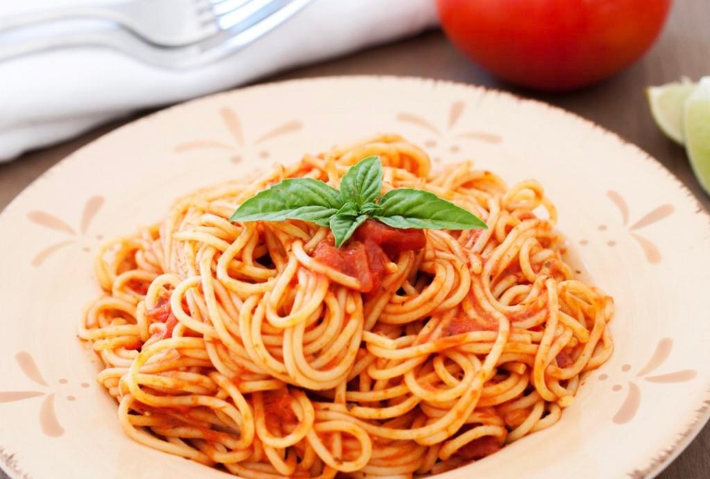 Pasta Marinara · Served with choice of pasta, salad, bread and butter and Romano cheese.