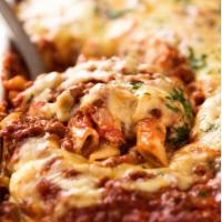 Baked Ziti Bolognese and Mozzarella · Served with salad, bread and butter and Romano cheese.
