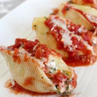 Stuffed Shells · Served with salad, bread and butter and Romano cheese.